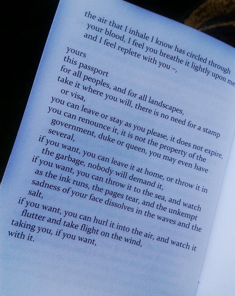A view of an inside page of the English edition of Antoine Cassar’s Passport-poem. It reads: “yours/this passport/for all peoples, and for all landscapes,/take it where you will, there is no need for a stamp or visa,/you can leave or stay as you please, it does not expire,/you can renounce it, it is not the property of the government, duke or queen, you may even have several,/if you want, you can leave it at home, or throw it in the garbage, nobody will demand it,/if you want, you can throw it into the sea, and watch as the ink runs, the pages tear, and the unkempt sadness of your face dissolves in the waves and the salt,/if you want, you can hurl it into the air, and watch it flutter and take flight on the wind,/taking you, if you want,/with it.”